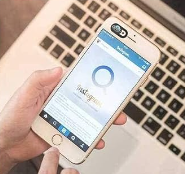 Ultra-thin webcam privacy cover applied on a smartphone, showing the easy sliding mechanism for digital security